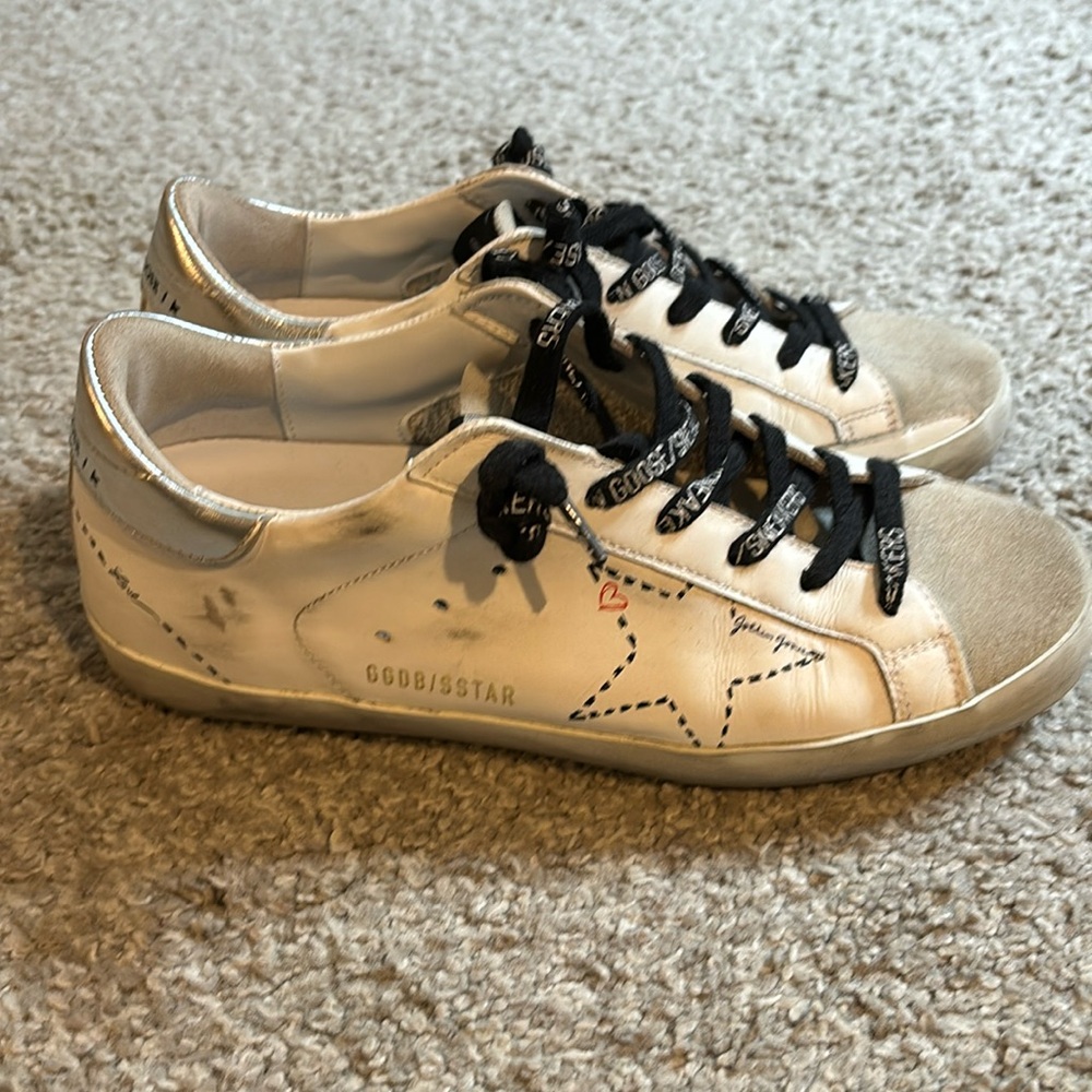 Golden goose white superstar sneakers with logo laces